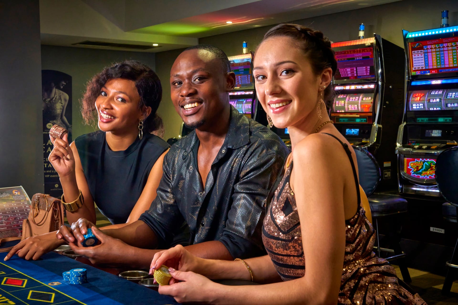 Guests at glowing slot machines at Mmabatho Palms casino, Mahikeng