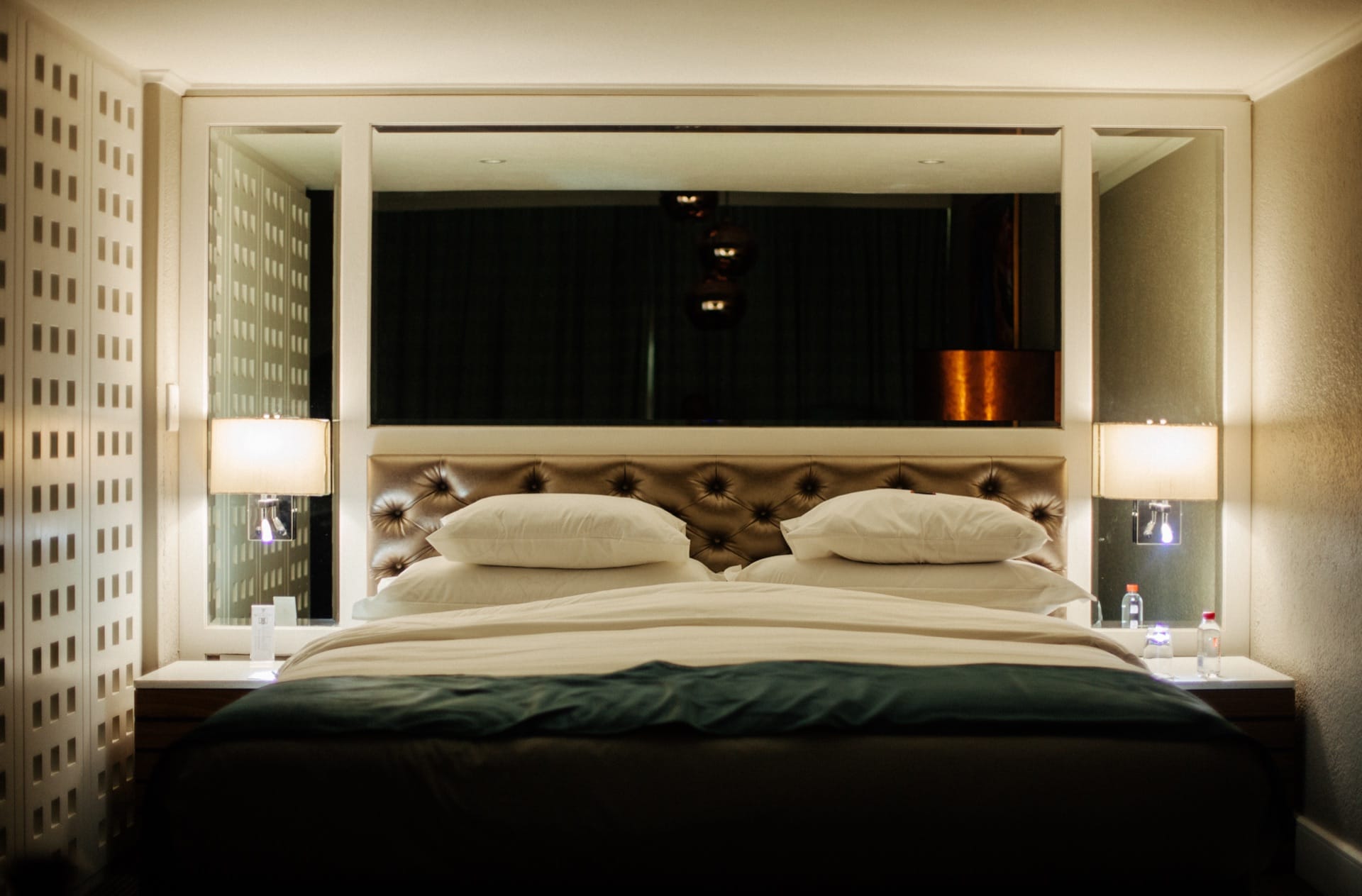 Softly lit Executive Villa king bed in the evening at Walmont at Mmabatho Palms, Mahikeng
